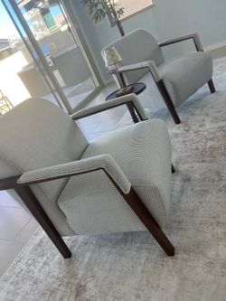 Two brooks brothers chairs and small table