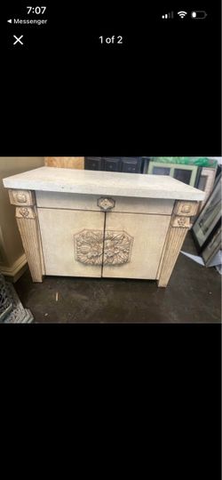 Ornate Two-Door Cabinet with Stone Top