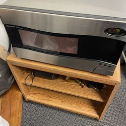 Microwave works great with this stand 65