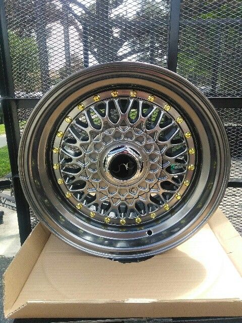 JNC wheels 15x8 gunmetal with gold rivets