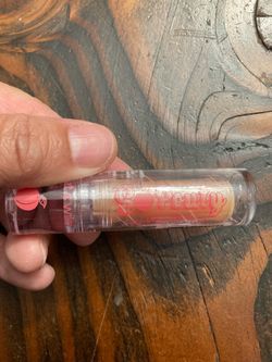 Woman’s Lip Gloss By Wet & Wild