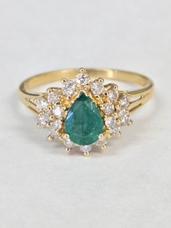 18kt Gold Emerald and Diamond Halo Ring