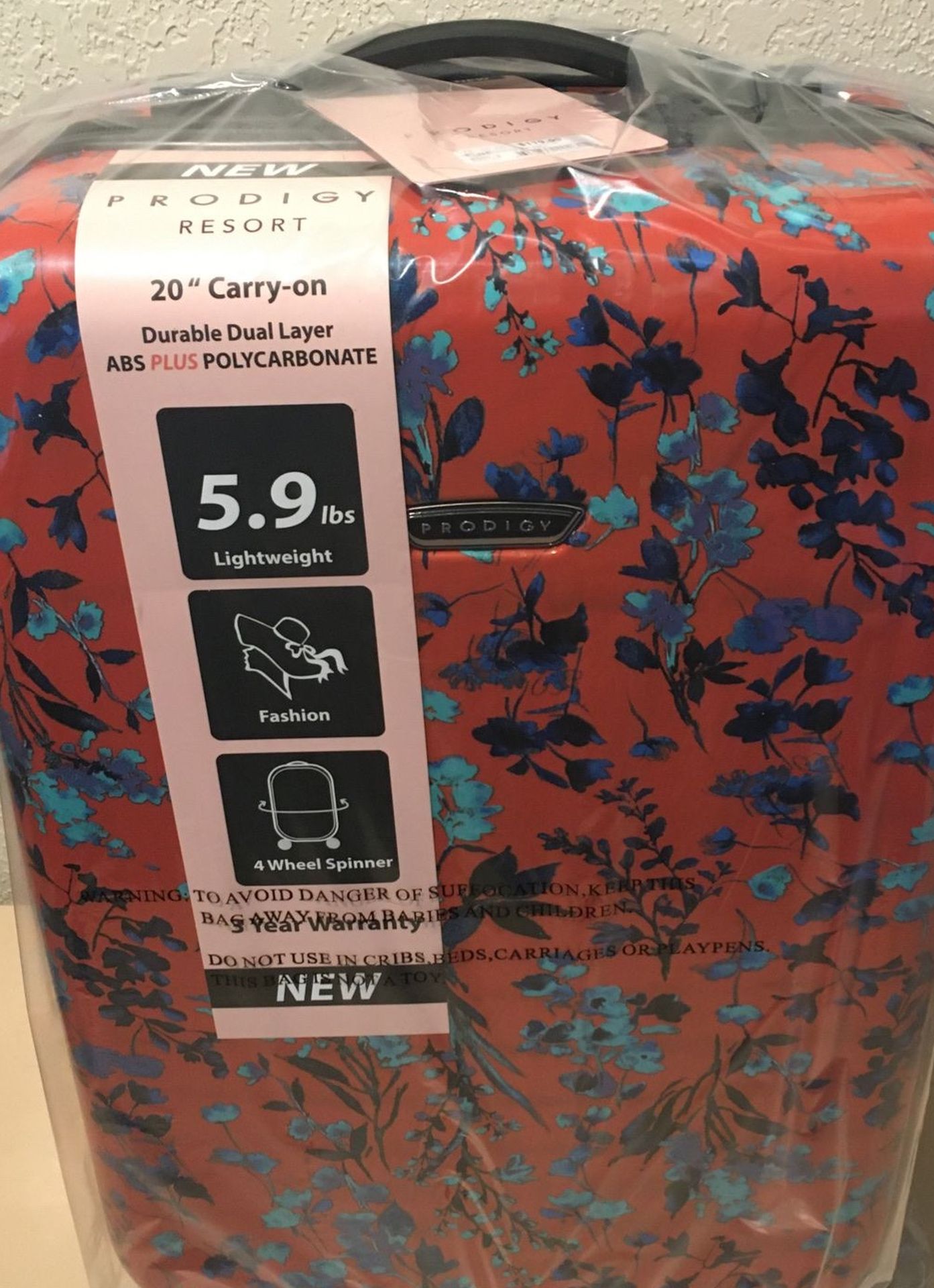 Prodigy Carry-on Rolling Spinner Luggage NWT
