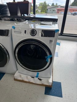 GE 4.8 cu. ft. Smart White Front Load Washer with OdorBlock UltraFresh Vent System and Sanitize