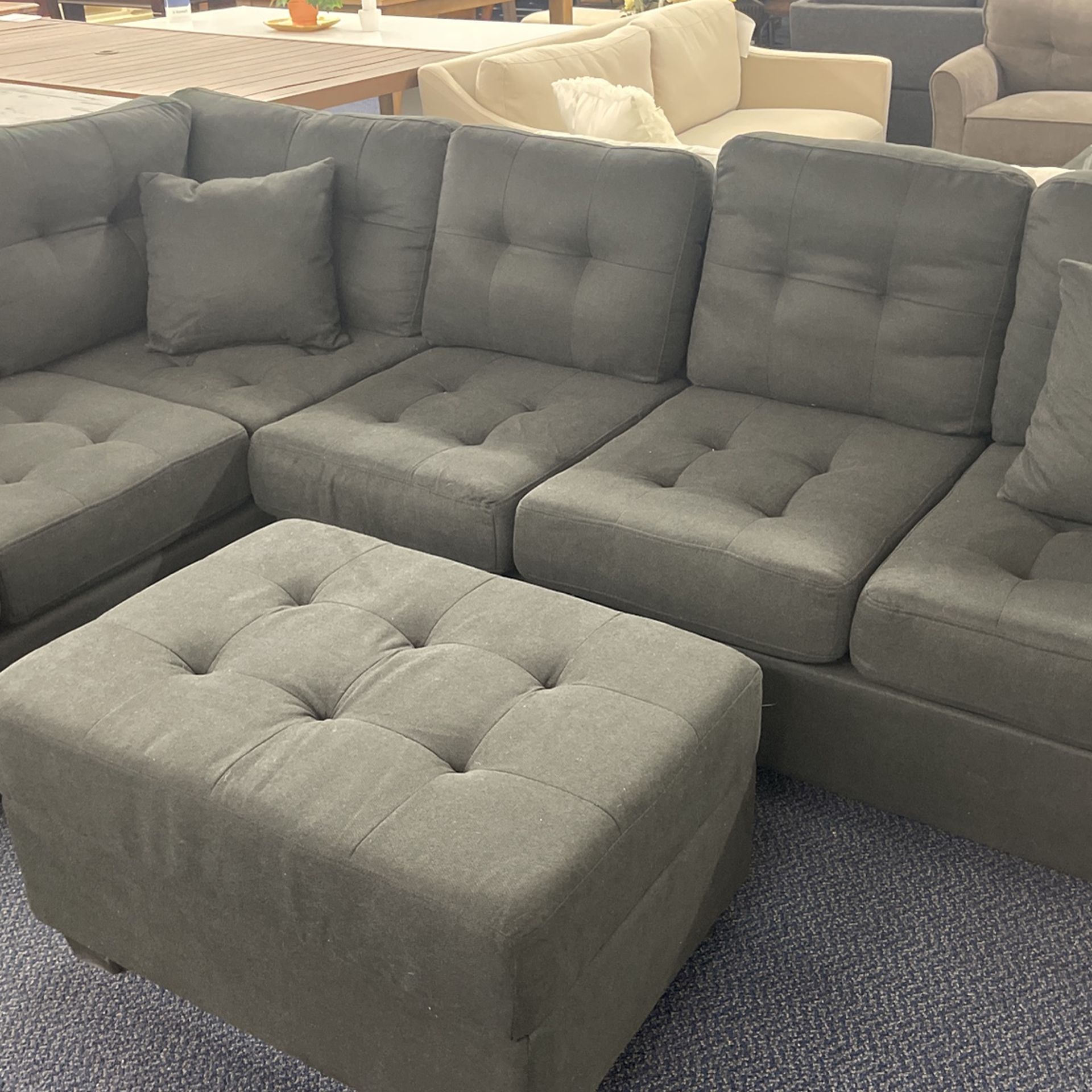 Sectional W/ Drop Cup Holder And Storage Ottoman