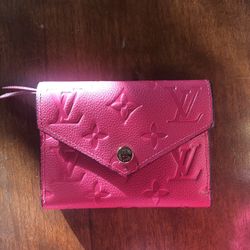 Pink Louis Vuitton Victorine leather wallet