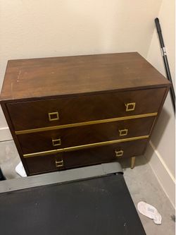 Dresser with gold handles