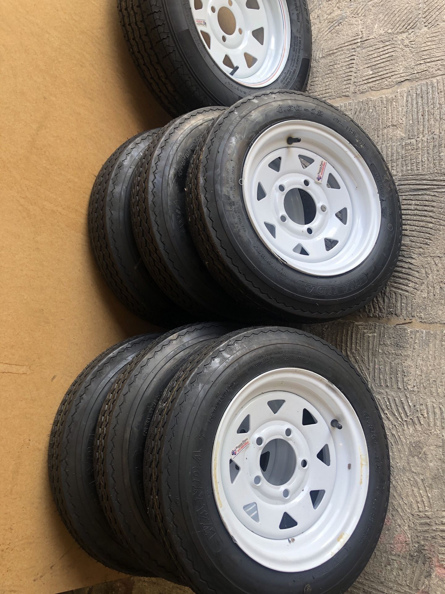 12” boat trailer tire and rim 5 lug brand new many in stock for Sale in