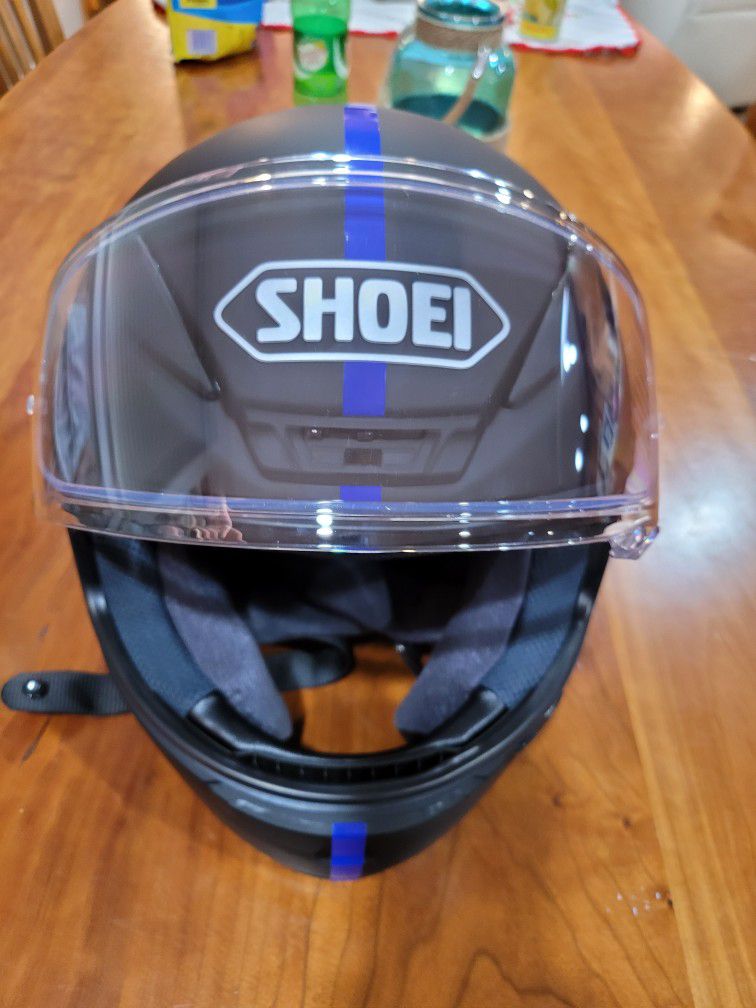 Photo Shoei matt black motorcycle helmet
