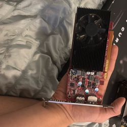 The item shown is an AMD Radeon RX 6400 graphics card.  It features 4GB of GDDR6 memory. It utilizes AMD's RDNA 2 architecture. It has a low-profile, 