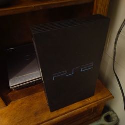 PS2 No Controllers. ** Only Power Cord Comes With It** $20
