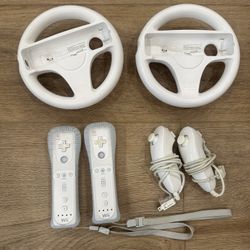 Nintendo Wii controller bundle with remotes, nunchucks and Mario Kart steering wheels