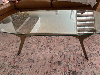 Elegant Glass Coffee Table with Gold Sculptural Base