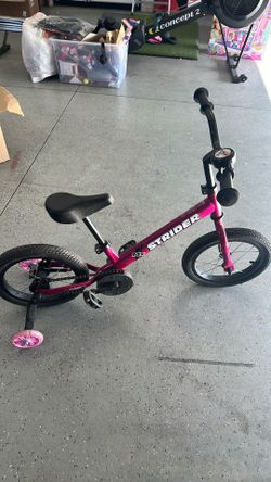 STRIDER 14X with training wheels.