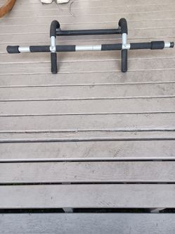 Pull bar for doorway