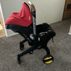 Doona Car Seat & Stroller, Red - All-in-One Travel System