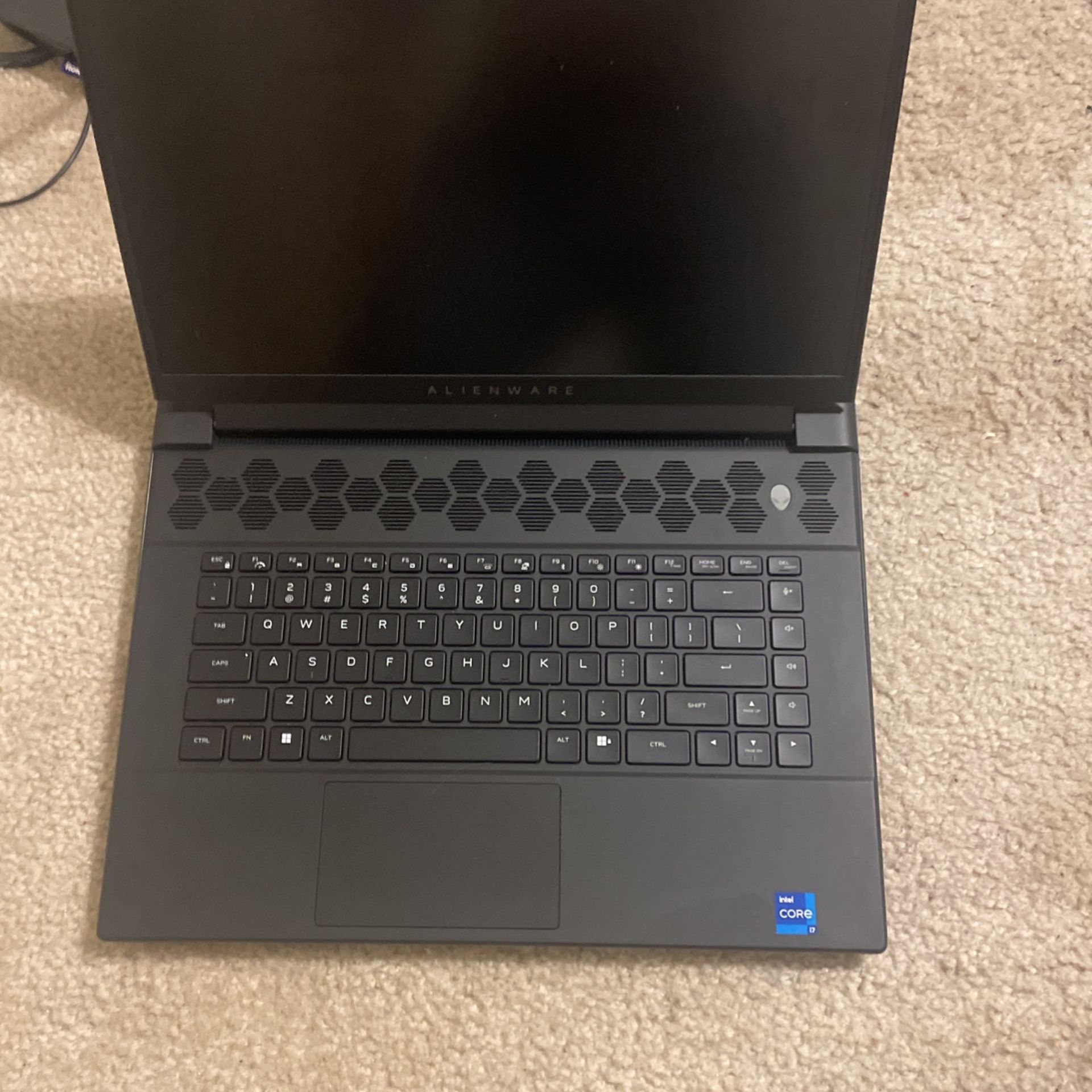 Alienware laptop keyboard and mouse