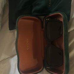 Gucci GG1084S rectangular-frame sunglasses in black acetate