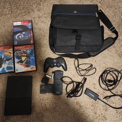 Sony PlayStation 2 Slim plus Accessories and Games