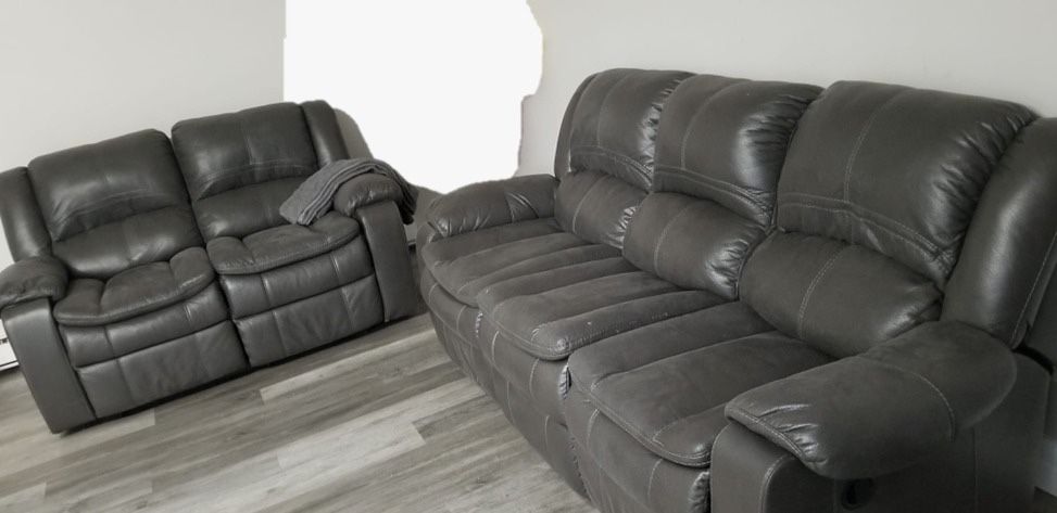 Gray Leather manual reclining couches