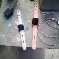 A Pink And White Apple Watch  Good Condition 