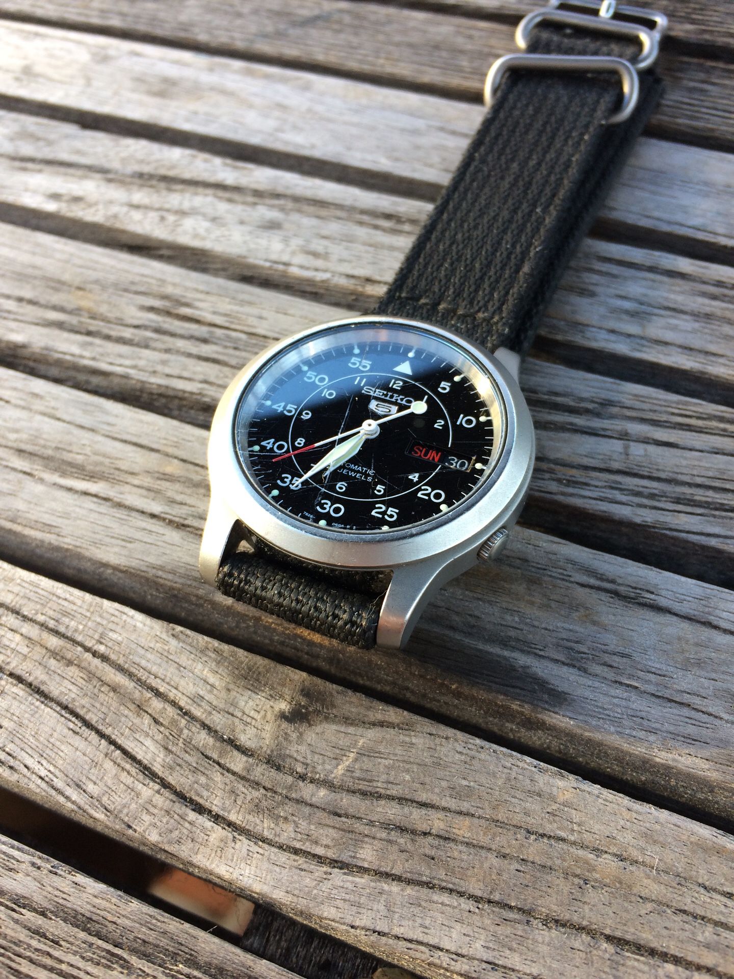 Seiko SNK809 — Scratched Hardlex but Good Condition