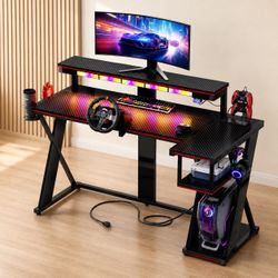 57.36in” W Black L-shaped Gaming Desk with monitor stand and power outlet
