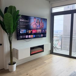 Floating TV Stand with Built-In Electric Fireplace | $300 OBO