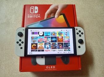 Nintendo Switch OLED Model Loaded with 125 Switch Games