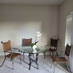 Glass table and iron chairs