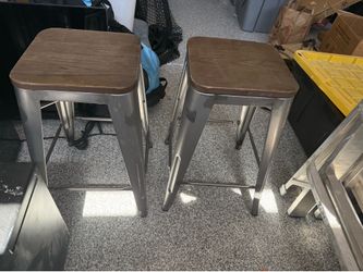 Two industrial bar stools, real wood seats