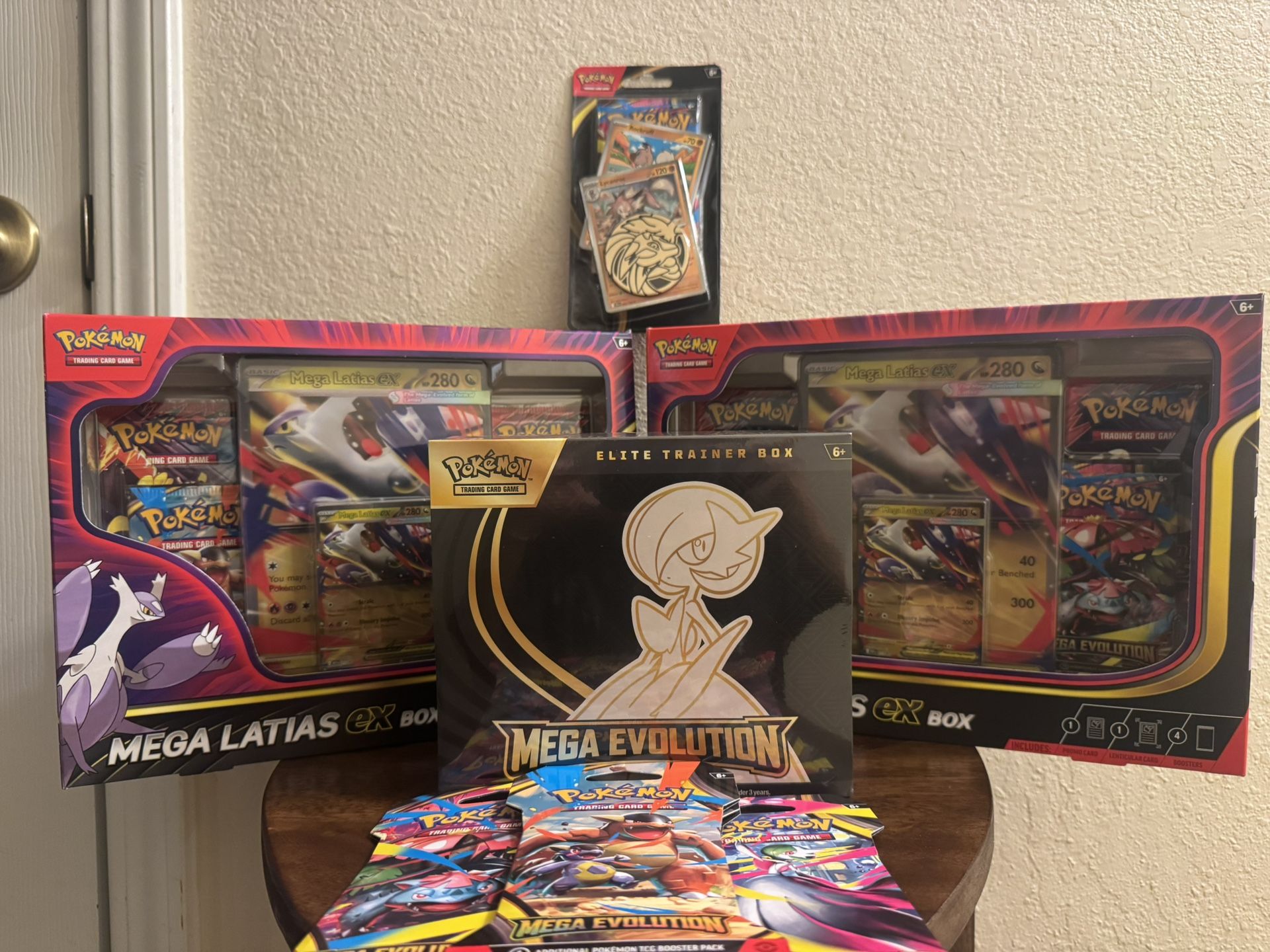 Lot of Pokémon new releases sets in hand. All sealed