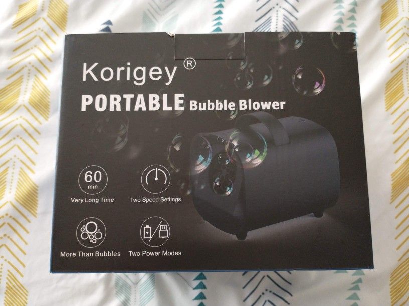 PORTABLE BUBBLE BLOWER