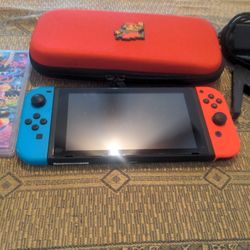 Nintendo Switch Used Plus One Game The Case The Charger And The Joystick All Used Excellent Working Condition.