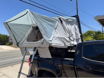 Roof top tent and truck bed rack