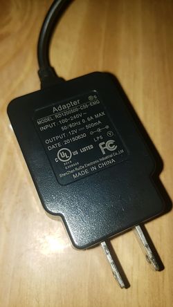 universal switching adapter, MODEL #RD1200500-C55-EMG
