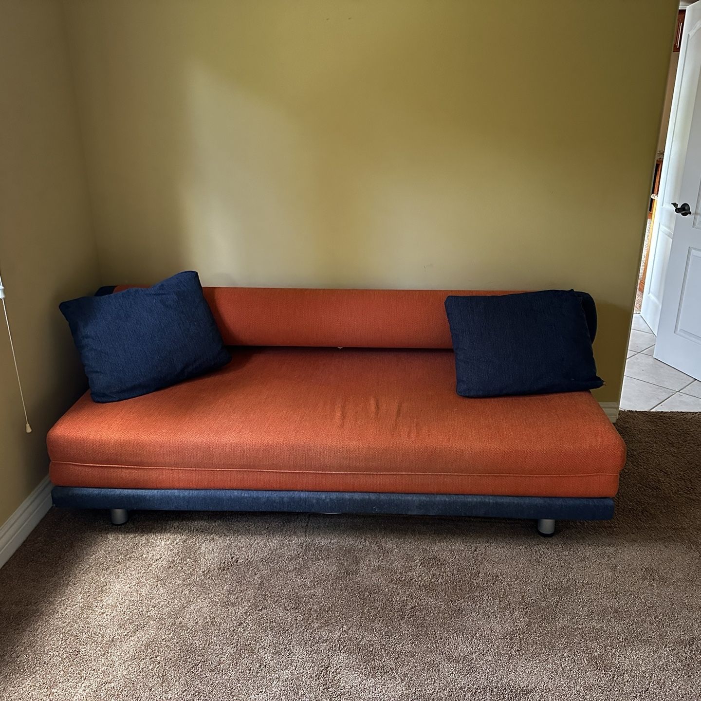 Really Cool Futon Couch That Makes Into A Huge King Size Bed. 