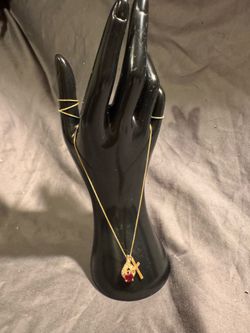 Gold tone Chain ft two charms