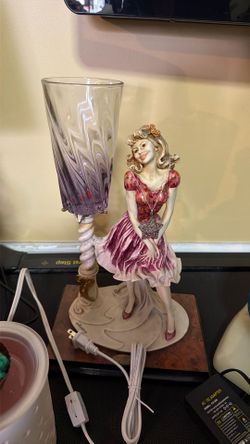 Statue with vase