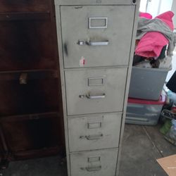 Metal File Cabinet. Works Good But Doesn't Have A Lock Or Key