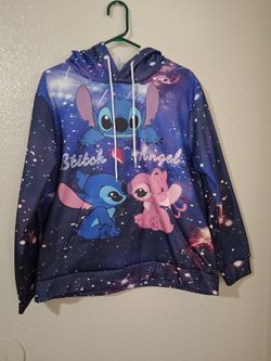 A cute stitch and angel sweater size,medium-large from  Ross color(blue white dots)