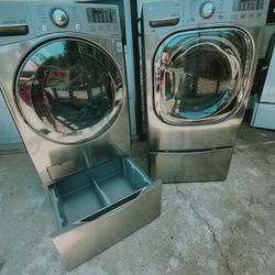Used Lg washer and electric dryer with pedestal 