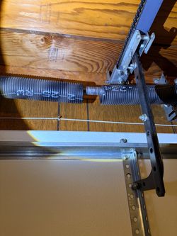 Overhead Garage Door Broken spring Opener Off Track Adjustment Replace And Parts