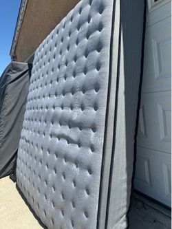 Nice Calif king bed mattress with Iron frame both in good conditions