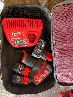 Milwaukee M12 FUEL SURGE Impact Driver + 3 Batteries