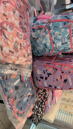 12 backpack purple , black and pink