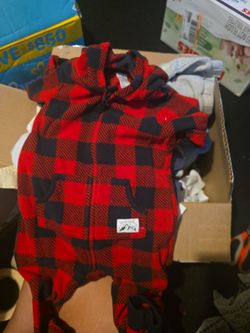 Box full of baby boy clothes
