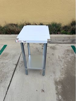 Work table 18” x 24” stainless steel top galvanized legs and undershelf