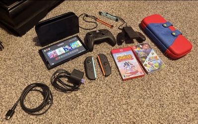 Nintendo Switch 2 Gaming Console w/ Case, Controller, And 2 Games