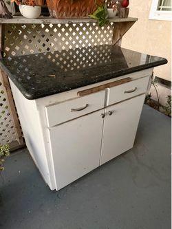 Kitchen or Garage End Cabinet with granit counter top